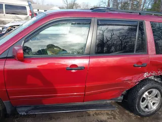 2004 Honda Pilot EX with VIN 5FNYF18674B003260, listed as a IAAI auction lot 41898340 with 214,249 mi miles. Bid and sale history available at carsss.com. Image 14.