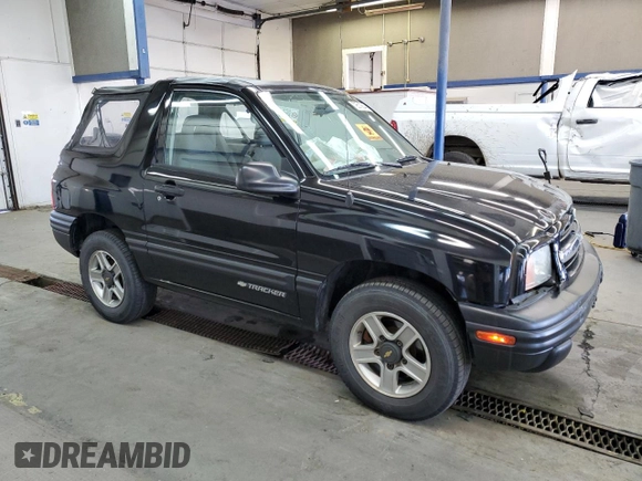 2002 Chevrolet Tracker with VIN 2CNBJ18CX26906088, listed as a Copart auction lot 79519944 with 111,342 mi miles and Salvage title. Bid and sale history available at DreamBid. Image 4.