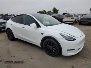 2022 Tesla Model Y Performance с VIN 7SAYGDEFXNF384268, выставлен на аукционе Copart как лот 60141005 с пробегом Не указан миль и Списание • Salvage title. История ставок и продаж доступна на DreamBid. Изображение 4.