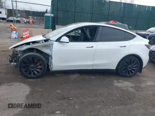 2021 Tesla Model Y Performance with VIN 5YJYGDEF1MF262930, listed as a IAAI auction lot 41606321 with 28,882 mi miles and . Bid and sale history available at DreamBid. Image 14.