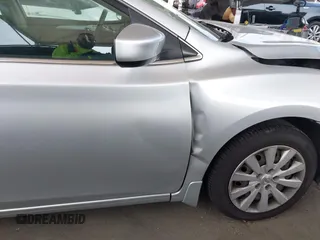 2015 Nissan Sentra SV z VIN 3N1AB7AP9FY319370, wystawiony jako IAAI lot #42098193 z przebiegiem 95 099 mil mil oraz . Historia ofert i sprzedaży dostępna na DreamBid. Obrazek 18.