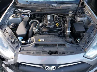 2014 Hyundai Genesis Coupe 2.0T z VIN KMHHT6KD6EU119079, wystawiony jako Copart lot #83364634 z przebiegiem 85 647 mil mil oraz Szkoda całkowita • Salvage title. Historia ofert i sprzedaży dostępna na DreamBid. Obrazek 11.