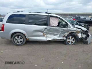 2010 Dodge Grand Caravan SXT with VIN 2D4RN5D13AR180609, listed as a IAAI auction lot 41857215 with Not Provided miles and . Bid and sale history available at DreamBid. Image 13.