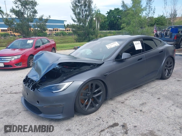 2023 Tesla Model S with VIN 5YJSA1E54PF501565, listed as a IAAI auction lot 42244953 with Not provided miles and . Bid and sale history available at DreamBid. Image 19.