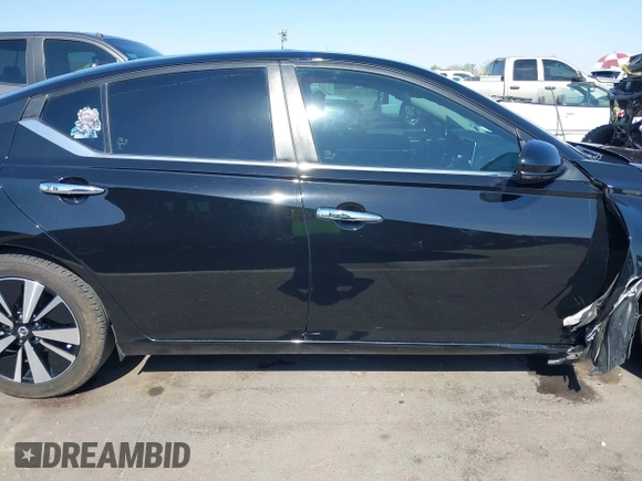 2021 Nissan Altima SV with VIN 1N4BL4DV0MN384955, listed as a IAAI auction lot 42353612 with 78,685 mi miles and . Bid and sale history available at DreamBid. Image 12.