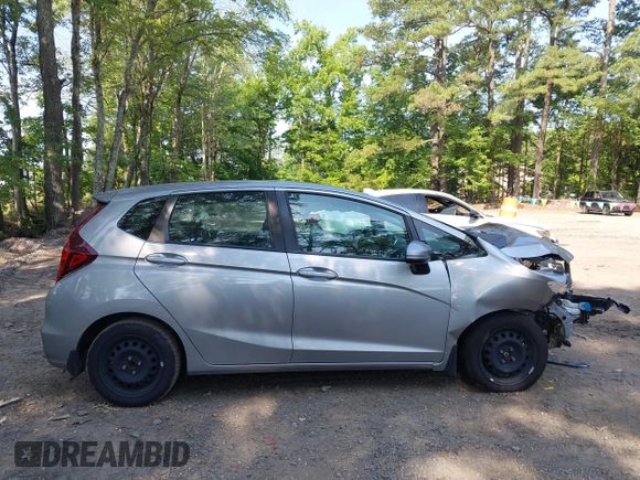 2020 Honda Fit LX z VIN 3HGGK5H47LM717334, wystawiony jako IAAI lot #42574053 z przebiegiem 81 279 mil mil oraz . Historia ofert i sprzedaży dostępna na DreamBid. Obrazek 13.
