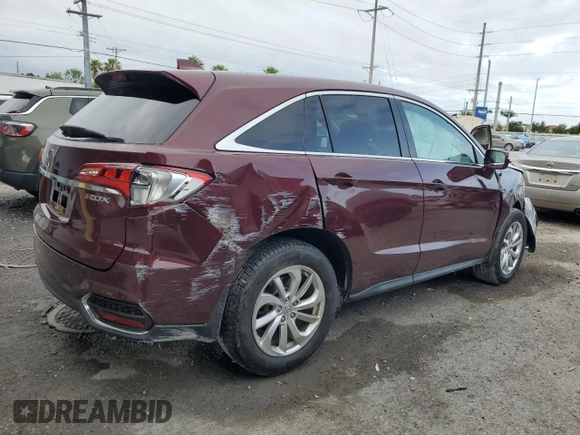 2018 Acura RDX Technology with VIN 5J8TB3H5XJL002817, listed as a Copart auction lot 59493895 with 107,378 mi miles and Salvage title. Bid and sale history available at DreamBid. Image 3.