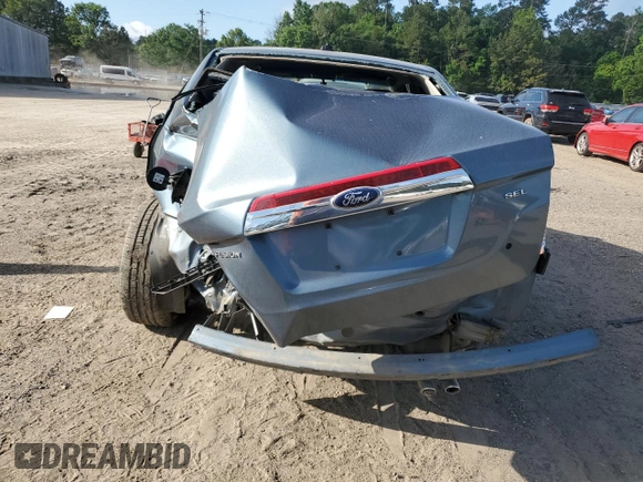 2012 Ford Fusion SEL z VIN 3FAHP0JA9CR333944, wystawiony jako Copart lot #56907605 z przebiegiem 180 386 mil mil oraz Szkoda całkowita • Salvage title. Historia ofert i sprzedaży dostępna na DreamBid. Obrazek 6.