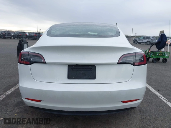 2020 Tesla Model 3 Standard Range Plus z VIN 5YJ3E1EA3LF590450, wystawiony jako IAAI lot #42026296 z przebiegiem 68 242 mil mil oraz . Historia ofert i sprzedaży dostępna na DreamBid. Obrazek 15.