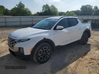 2022 Hyundai Santa Cruz SEL Premium z VIN 5NTJDDAF0NH017475, wystawiony jako Copart lot #56758985 z przebiegiem 14 978 mil mil oraz Szkoda całkowita • Salvage title. Historia ofert i sprzedaży dostępna na DreamBid. Obrazek 1.