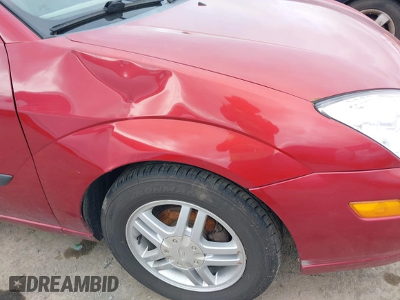 2003 Ford Focus ZX3 with VIN 3FAFP31Z23R187918, listed as a IAAI auction lot 41969325 with Not provided miles and . Bid and sale history available at DreamBid. Image 13.