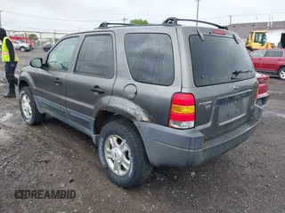 2003 Ford Escape XLT Popular 2 with VIN 1FMYU93133KD90533, listed as a IAAI auction lot 42361131 with 172,326 mi miles and . Bid and sale history available at DreamBid. Image 3.