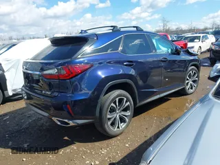 2016 Lexus RX 350 with VIN 2T2BZMCA2GC004895, listed as a IAAI auction lot 41859749 with 104,370 mi miles and . Bid and sale history available at DreamBid. Image 4.