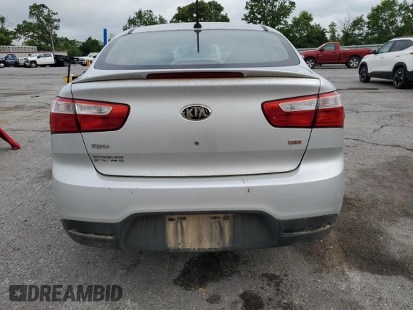 2013 Kia Rio LX z VIN KNADM4A35D6280066, wystawiony jako Copart lot #57293585 z przebiegiem 129 281 mil mil oraz Szkoda całkowita • Salvage title. Historia ofert i sprzedaży dostępna na DreamBid. Obrazek 6.
