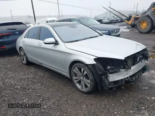 2014 Mercedes-Benz S S 550 with VIN WDDUG8FB2EA054105, listed as a IAAI auction lot 42010715 with 166,812 mi miles. Bid and sale history available at carsss.com. Image 1.