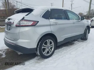 2018 Ford Edge Titanium with VIN 2FMPK4K89JBC14502, listed as a IAAI auction lot 41321136 with 143,052 mi miles. Bid and sale history available at carsss.com. Image 4.
