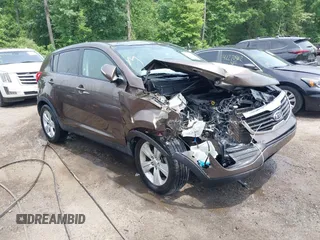 2012 Kia Sportage LX z VIN KNDPB3A20C7290990, wystawiony jako IAAI lot #42264420 z przebiegiem 87 994 mil mil oraz . Historia ofert i sprzedaży dostępna na DreamBid. Obrazek 1.