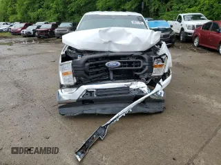 2021 Ford F-150 XL with VIN 1FTFX1E51MFC05216, listed as a Copart auction lot 56571785 with 94,584 mi miles and Salvage title. Bid and sale history available at DreamBid. Image 5.
