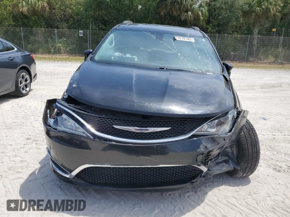 2017 Chrysler Pacifica Touring L with VIN 2C4RC1BG7HR551641, listed as a Copart auction lot 51810185 with 66,860 mi miles and Salvage Title. Bid and sale history available at DreamBid. Image 5.