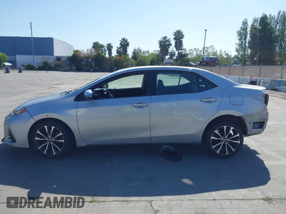 2017 Toyota Corolla L z VIN 5YFBURHE6HP652091, wystawiony jako IAAI lot #42131898 z przebiegiem 380 284 mil mil oraz . Historia ofert i sprzedaży dostępna na DreamBid. Obrazek 14.