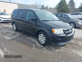 2017 Dodge Grand Caravan SE z VIN 2C4RDGBG3HR687183, wystawiony jako IAAI lot #41971615 z przebiegiem 158 201 mil mil oraz . Historia ofert i sprzedaży dostępna na DreamBid. Obrazek 1.