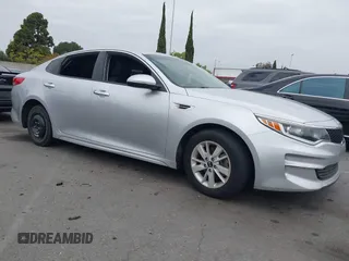 2016 Kia Optima LX with VIN 5XXGT4L34GG023812, listed as a IAAI auction lot 42034160 with 96,720 mi miles and . Bid and sale history available at DreamBid. Image 1.