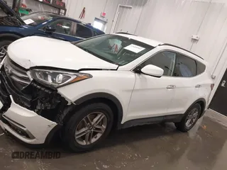 2017 Hyundai Santa Fe 2.4L z VIN 5XYZU3LBXHG444308, wystawiony jako IAAI lot #41685902 z przebiegiem 70 838 mil mil oraz . Historia ofert i sprzedaży dostępna na DreamBid. Obrazek 14.