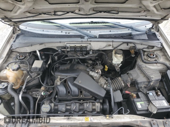2005 Ford Escape Limited z VIN 1FMYU04195KB37679, wystawiony jako Copart lot #50656585 z przebiegiem 218 891 mil mil oraz Szkoda całkowita • Salvage title. Historia ofert i sprzedaży dostępna na DreamBid. Obrazek 13.