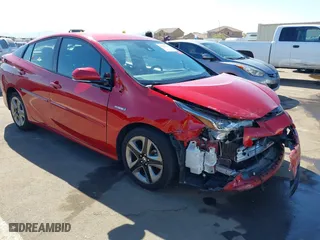 2019 Toyota Prius L Eco with VIN JTDKARFU1K3087249, listed as a IAAI auction lot 41583992 with 55,486 mi miles. Bid and sale history available at carsss.com. Image 1.