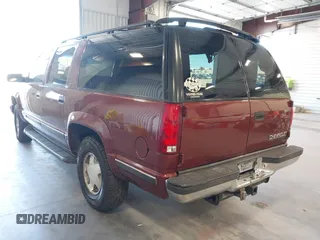 1999 Chevrolet Suburban z VIN 3GNFK16R4XG109638, wystawiony jako IAAI lot #42505642 z przebiegiem 274 795 mil mil oraz . Historia ofert i sprzedaży dostępna na DreamBid. Obrazek 3.