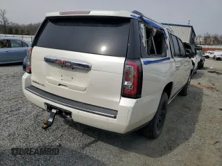 2015 GMC Yukon XL Denali z VIN 1GKS1JKJ7FR552458, wystawiony jako Copart lot #48248655 z przebiegiem 162 798 mil mil oraz Szkody całkowita. Historia ofert i sprzedaży dostępna na DreamBid. Obrazek 3.