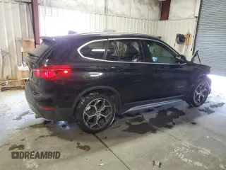 2018 BMW X1 xDrive28i with VIN WBXHT3C35J5K30657, listed as a Copart auction lot 43612815 with 61,181 mi miles and Salvage Title. Bid and sale history available at carsss.com. Image 3.