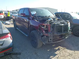 2019 Ram 1500 Big Horn z VIN 1C6RREFT7KN828779, wystawiony jako IAAI lot #41824690 z przebiegiem 112 888 mil mil oraz . Historia ofert i sprzedaży dostępna na DreamBid. Obrazek 1.