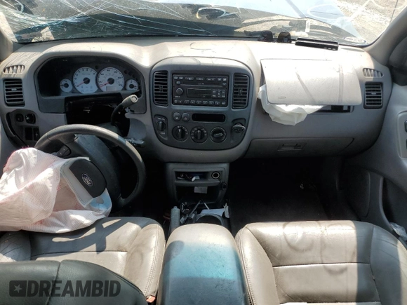2002 Ford Escape XLT Choice with VIN 1FMYU04122KA51299, listed as a Copart auction lot 59089055 with Not provided miles and Salvage title. Bid and sale history available at DreamBid. Image 8.