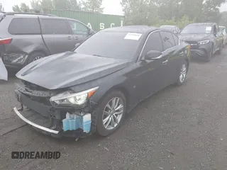 2014 Infiniti Q50 Premium z VIN JN1BV7AR2EM705630, wystawiony jako IAAI lot #42258650 z przebiegiem 109 151 mil mil oraz . Historia ofert i sprzedaży dostępna na DreamBid. Obrazek 20.