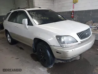 1999 Lexus RX 300 Luxury SUV with VIN JT6HF10U9X0007556, listed as a IAAI auction lot 41858694 with 999,999 mi miles. Bid and sale history available at carsss.com. Image 1.