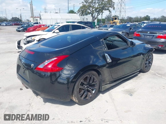 2017 Nissan 370Z with VIN JN1AZ4EH5HM954458, listed as a IAAI auction lot 41629907 with 113,606 mi miles. Bid and sale history available at carsss.com. Image 4.