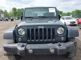 2017 Jeep Wrangler Sport z VIN 1C4AJWAG0HL754381, wystawiony jako IAAI lot #42366858 z przebiegiem 35 760 mil mil oraz . Historia ofert i sprzedaży dostępna na DreamBid. Obrazek 12.