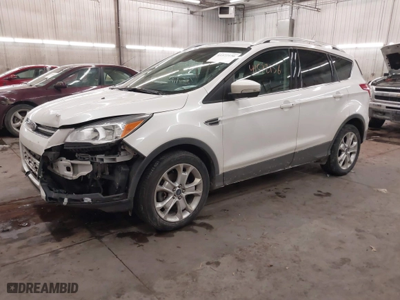 2016 Ford Escape Titanium with VIN 1FMCU9J91GUC27554, listed as a IAAI auction lot 41572156 with 135,670 mi miles. Bid and sale history available at carsss.com. Image 19.