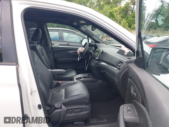 2021 Honda Passport EX-L with VIN 5FNYF8H54MB041738, listed as a IAAI auction lot 42310470 with 52,409 mi miles and . Bid and sale history available at DreamBid. Image 5.