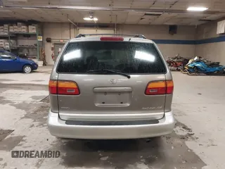 1999 Toyota Sienna LE z VIN 4T3ZF13CXXU127488, wystawiony jako IAAI lot #42334323 z przebiegiem 247 917 mil mil oraz . Historia ofert i sprzedaży dostępna na DreamBid. Obrazek 15.