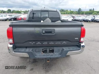 2017 Toyota Tacoma SR5 with VIN 3TMDZ5BN3HM027098, listed as a IAAI auction lot 42409977 with 97,224 mi miles and . Bid and sale history available at DreamBid. Image 17.