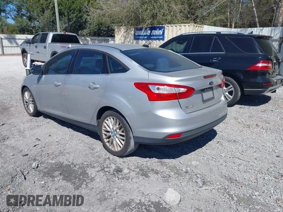 2012 Ford Focus SEL with VIN 1FAHP3H29CL114884, listed as a IAAI auction lot 41785864 with 180,095 mi miles. Bid and sale history available at carsss.com. Image 3.