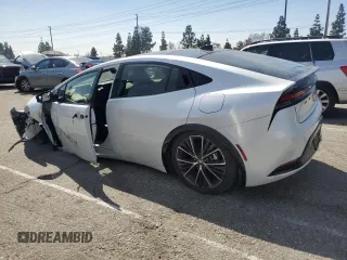 2024 Toyota Prius LE with VIN JTDACAAUXR3026703, listed as a Copart auction lot 50629445 with Not Provided miles and Salvage Title. Bid and sale history available at DreamBid. Image 2.