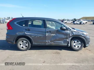 2015 Honda CR-V LX with VIN 3CZRM3H31FG709059, listed as a IAAI auction lot 42131551 with 98,738 mi miles and . Bid and sale history available at carsss.com. Image 13.