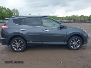 2017 Toyota RAV4 Hybrid Limited with VIN JTMDJREV8HD144858, listed as a IAAI auction lot 42092847 with 135,046 mi miles. Bid and sale history available at carsss.com. Image 13.