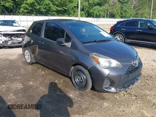 2015 Toyota Yaris L z VIN VNKJTUD35FA054329, wystawiony jako IAAI lot #42289132 z przebiegiem 122 257 mil mil oraz . Historia ofert i sprzedaży dostępna na DreamBid. Obrazek 1.
