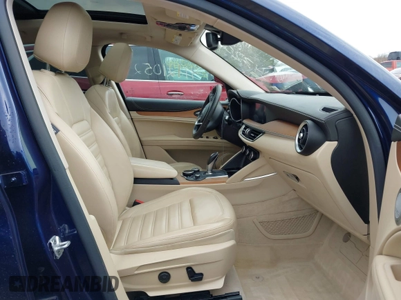 2019 Alfa Romeo Stelvio Ti z VIN ZASPAKBN4K7C43201, wystawiony jako IAAI lot #41121052 z przebiegiem 32 768 mil mil oraz . Historia ofert i sprzedaży dostępna na DreamBid. Obrazek 5.