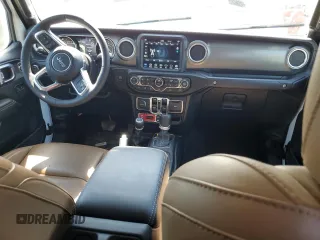 2023 Jeep Gladiator Rubicon with VIN 1C6JJTBG9PL546437, listed as a Copart auction lot 62536575 with 14,106 mi miles and Salvage title. Bid and sale history available at DreamBid. Image 8.
