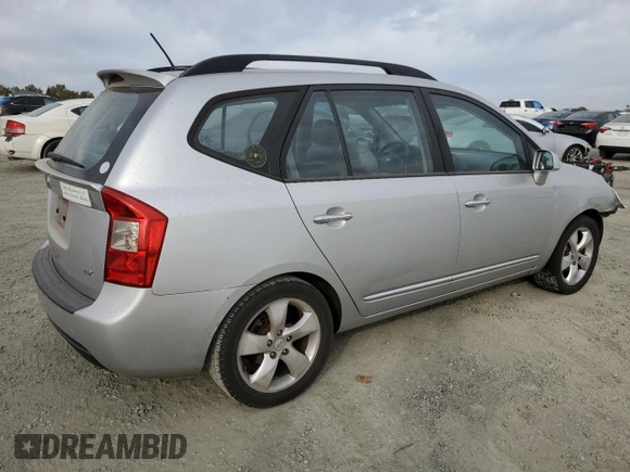 2009 Kia Rondo LX Base with VIN KNAFG528097222268, listed as a Copart auction lot 77797124 with 184,569 mi miles and Salvage Title. Bid and sale history available at carsss.com. Image 3.